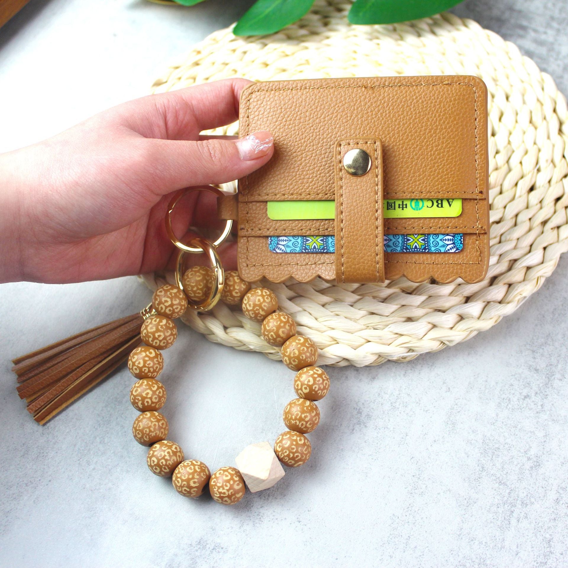 Wholesale Leopard Pattern Wood Bead Card Bag Tassel Wrist Keychain